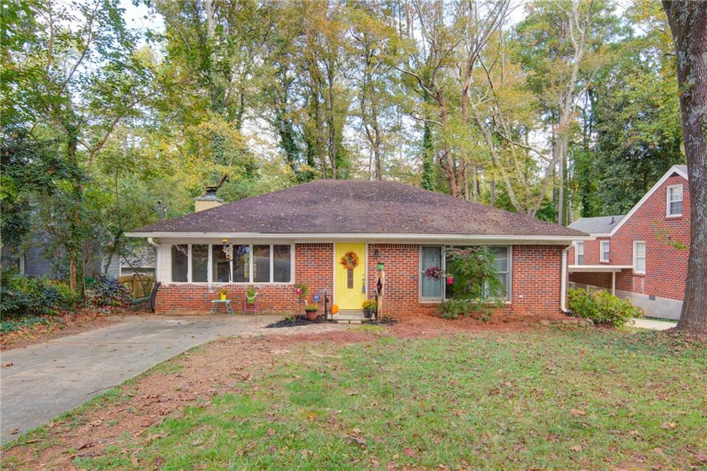 2576 Creekwood Terrace Decatur, GA 30030 - Photo 1 of 1 Look at this lovely late 50's brick home, much larger than it looks, freshly painted MCM yellow door!!