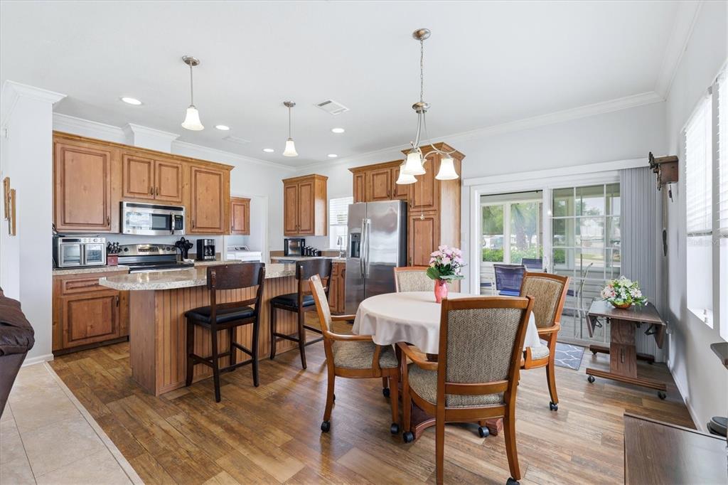 1 Meadow Circle Ellenton, FL 34222 - Photo 12 of 43 a view of a dining room with furniture window and outside view