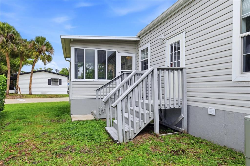 1 Meadow Circle Ellenton, FL 34222 - Photo 29 of 43 a view of a house with a yard and deck
