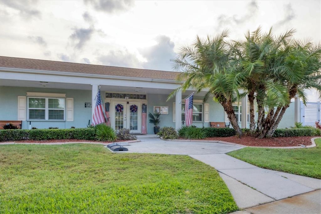 1 Meadow Circle Ellenton, FL 34222 - Photo 34 of 43 front view of a brick house with a yard