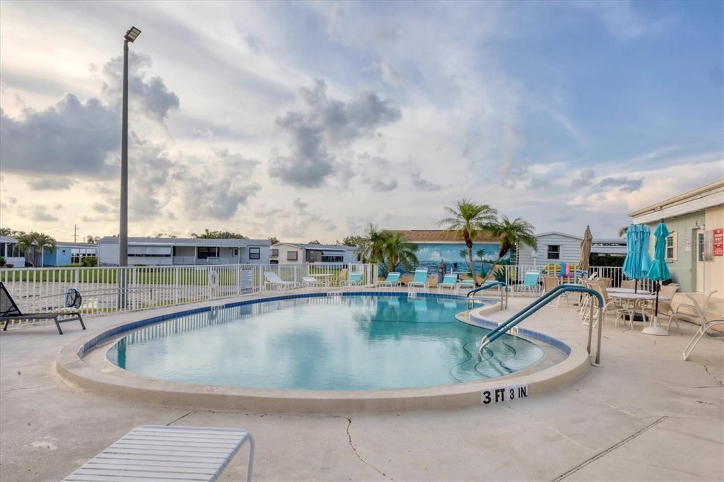 1 Meadow Circle Ellenton, FL 34222 - Photo 35 of 43 a view of a swimming pool with a terrace