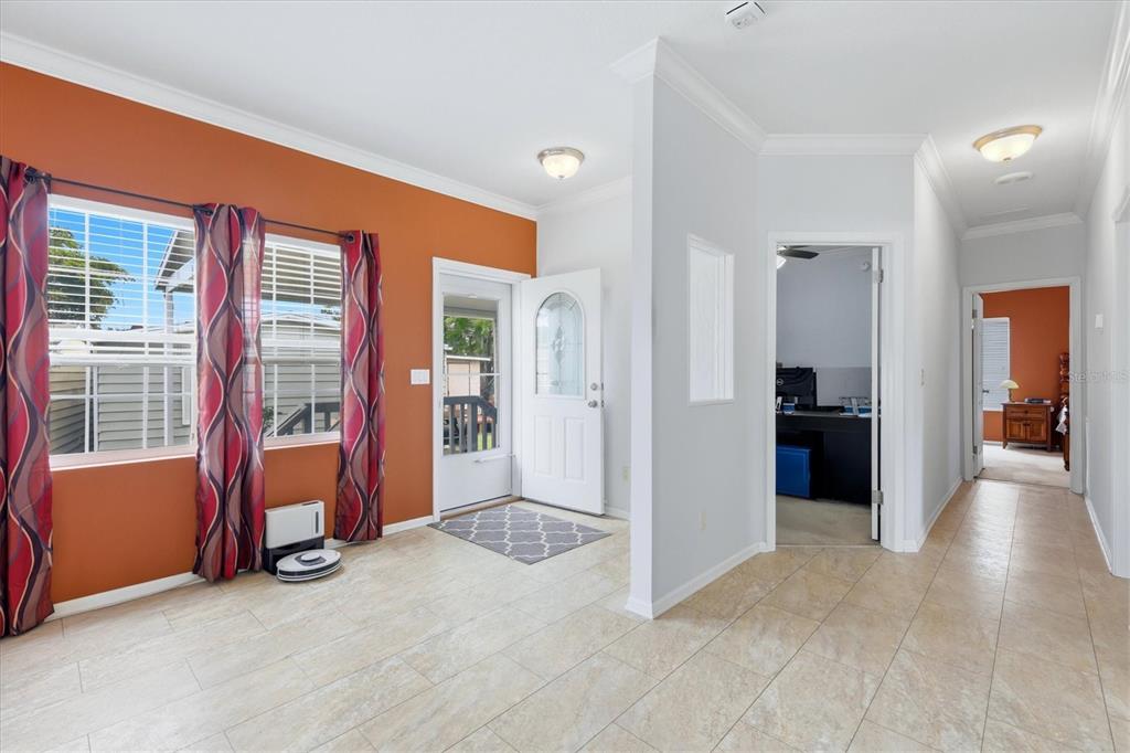 1 Meadow Circle Ellenton, FL 34222 - Photo 4 of 43 a view of a big room with wooden floor and windows