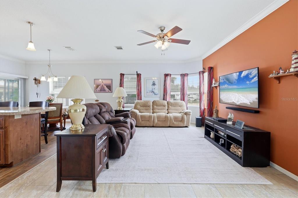 1 Meadow Circle Ellenton, FL 34222 - Photo 6 of 43 a living room with furniture and a flat screen tv