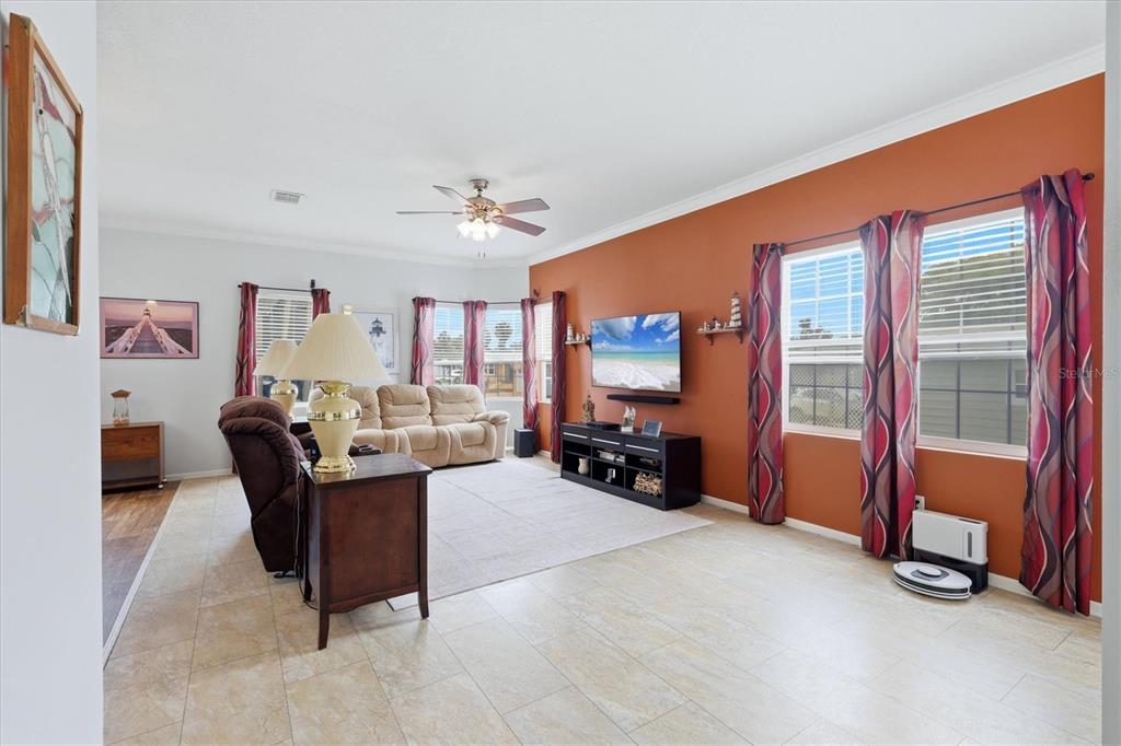 1 Meadow Circle Ellenton, FL 34222 - Photo 7 of 43 a living room with furniture and a flat screen tv