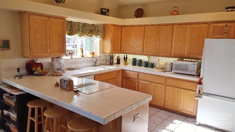 2598 Northeast Yellowpine Road Prineville, OR 97754 - Photo 10 of 23 Kitchen has under cabinet lighting.