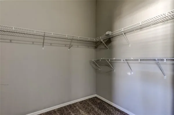 a view of a room with racks on the wall