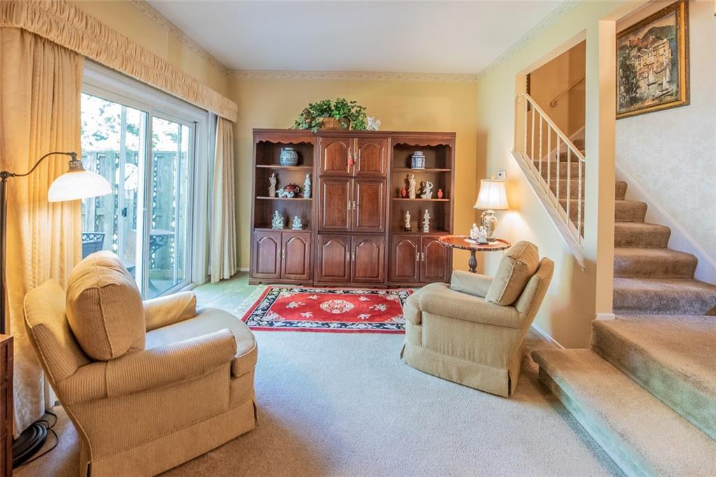 7 Raleigh Place Pittsburgh, PA 15239 - Photo 8 of 25 Sunken Living Room off Dining room! Beautiful sliding glass Door leads you to your Private Backyard Oasis!