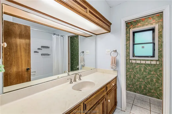 a view of backyard with green space