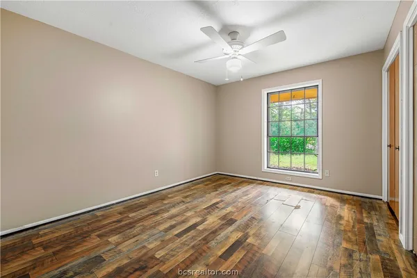 a backyard of a house with lots of green space