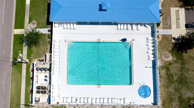 a view of swimming pool with a garden