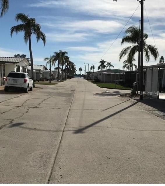 10315 Cortez Road West, Unit 347 Bradenton, FL 34210 - Photo 26 of 27 a view of car parked on the roadside