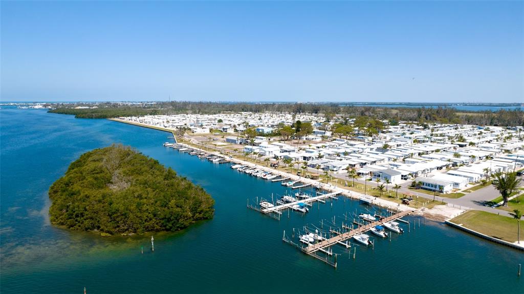 10315 Cortez Road West, Unit 347 Bradenton, FL 34210 - Photo 6 of 27 an aerial view of a house with a lake view