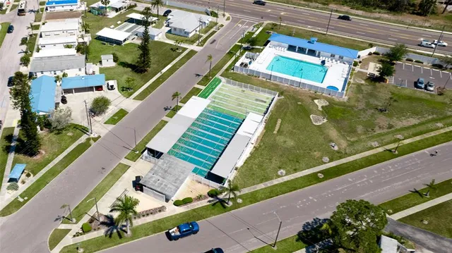 a view of a swimming pool next to a building