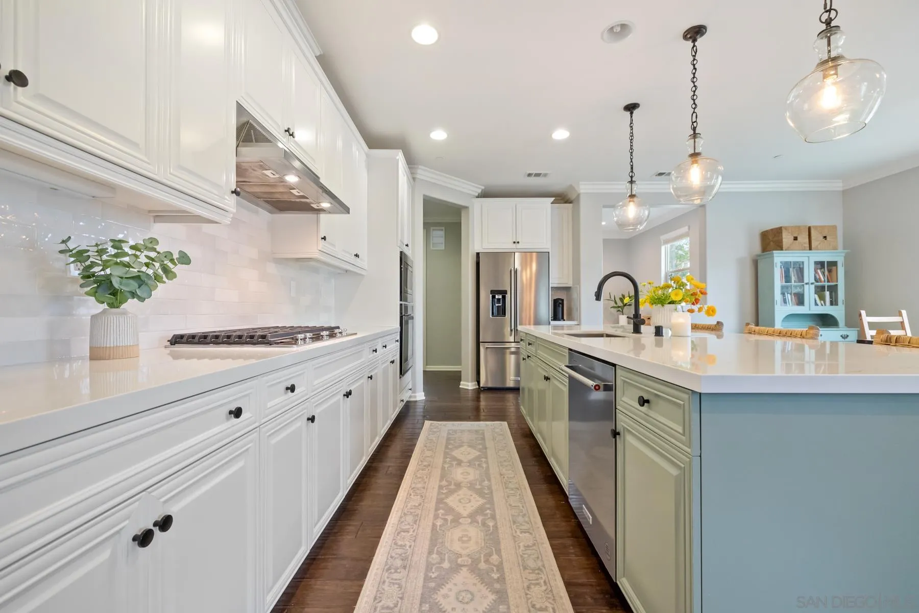 17519 Ralphs Ranch Road San Diego, CA 92127 - Photo 12 of 32 a large kitchen with granite countertop lots of counter space and a sink