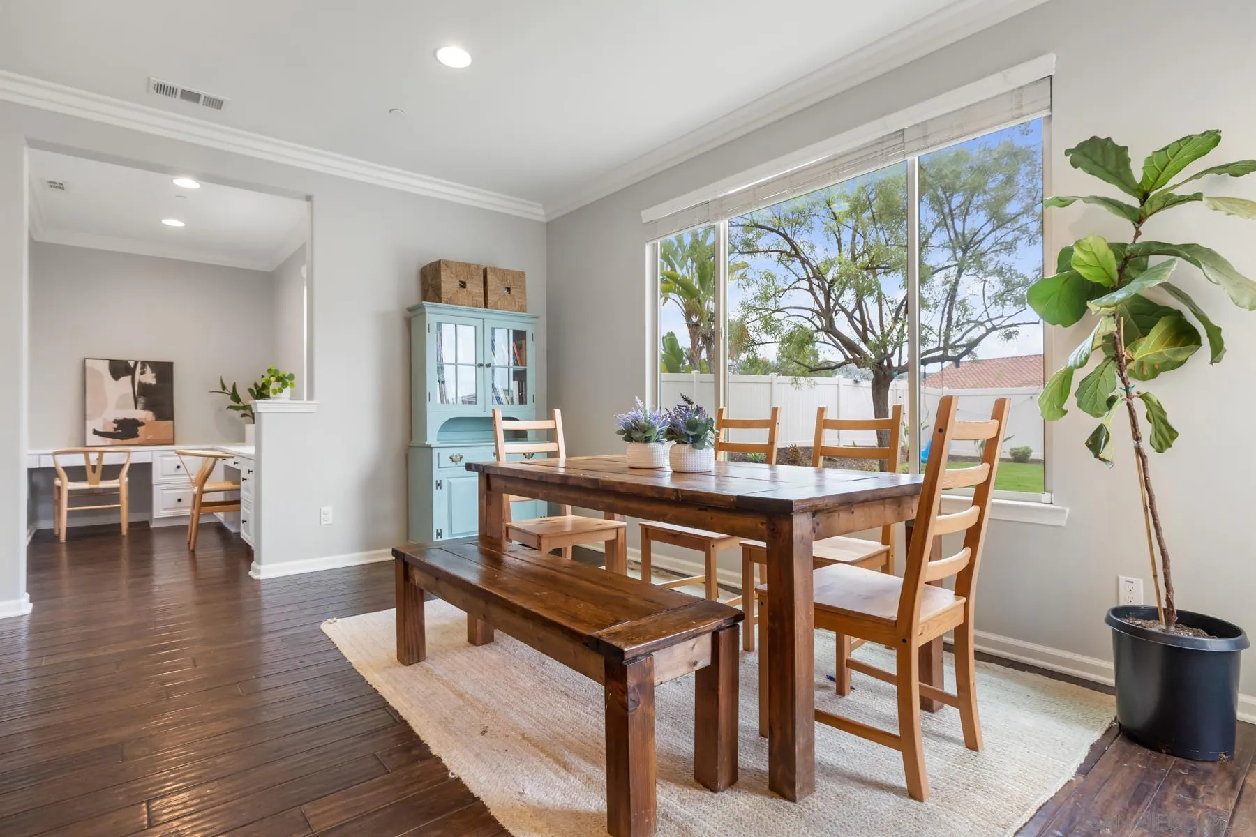 17519 Ralphs Ranch Road San Diego, CA 92127 - Photo 13 of 32 a dining room with furniture window and wooden floor