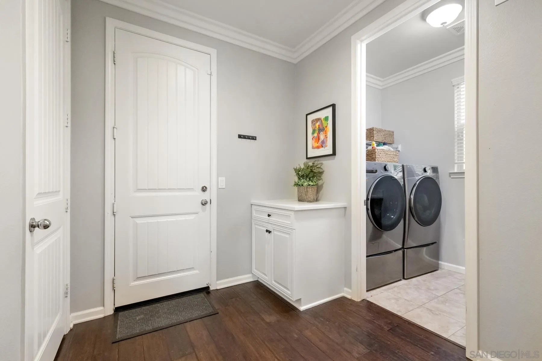 17519 Ralphs Ranch Road San Diego, CA 92127 - Photo 17 of 32 a view of a storage & utility room with washer and dryer