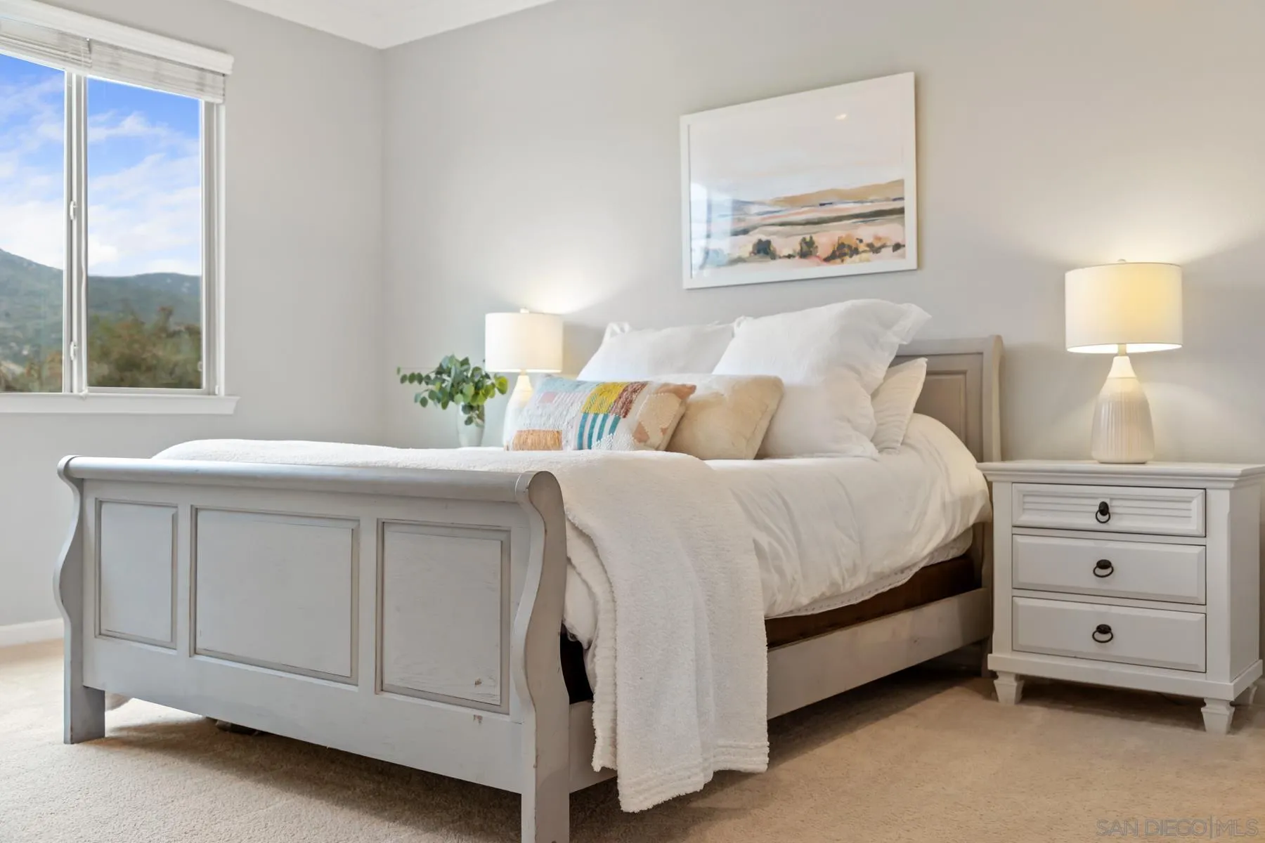 17519 Ralphs Ranch Road San Diego, CA 92127 - Photo 20 of 32 a living room with a bed and a window