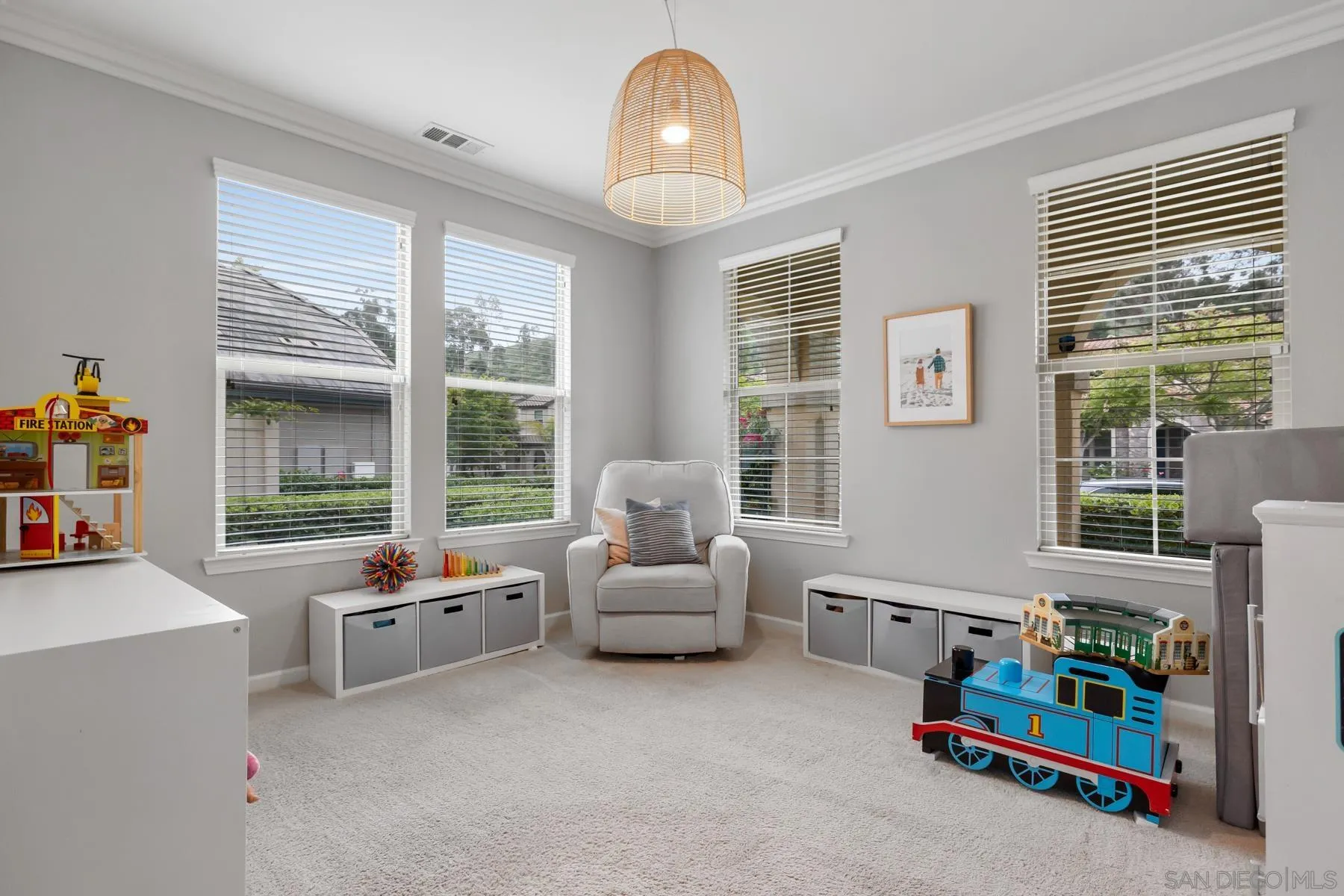 17519 Ralphs Ranch Road San Diego, CA 92127 - Photo 4 of 32 a living room with furniture and floor to ceiling windows