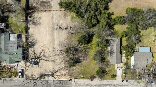 an aerial view of house with mountain view