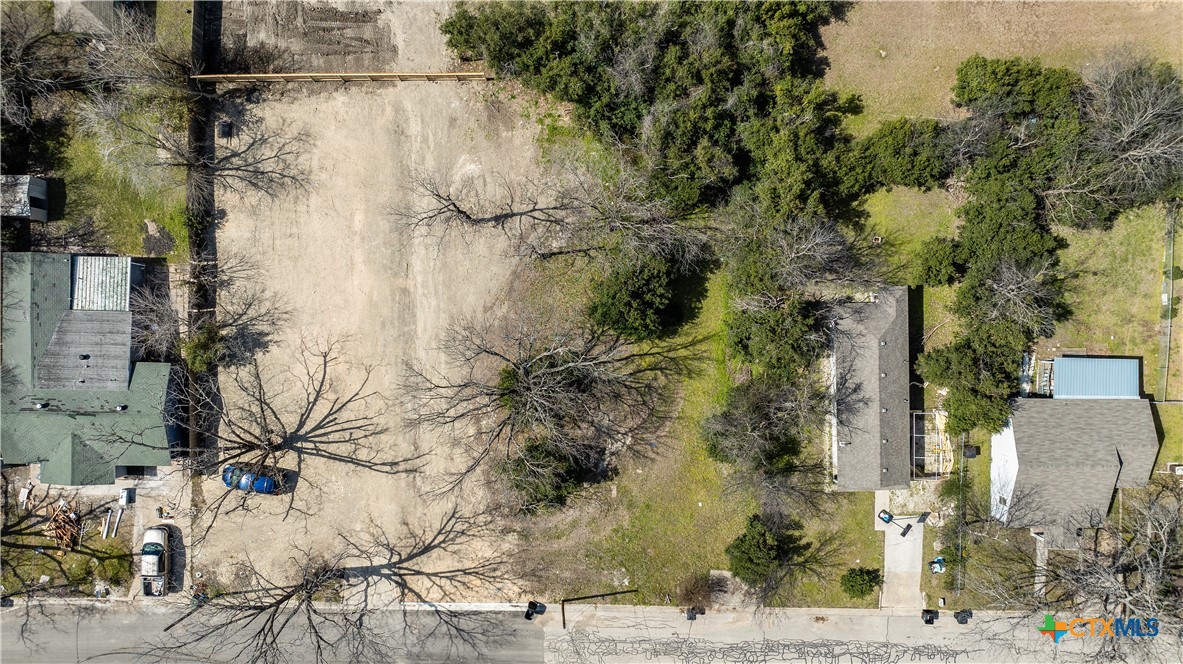 an aerial view of house with mountain view
