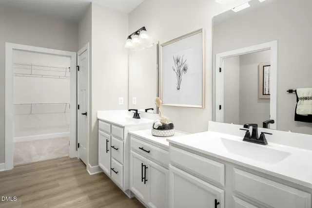 a bedroom with a bed and couch