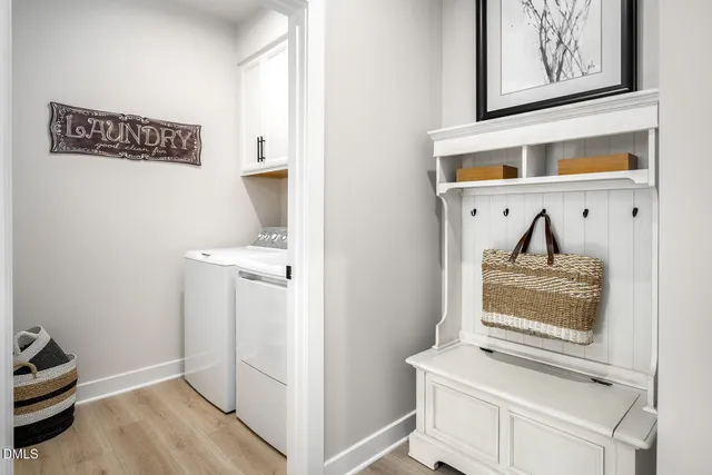a bathroom with a double vanity sink toilet a shower and a bathtub