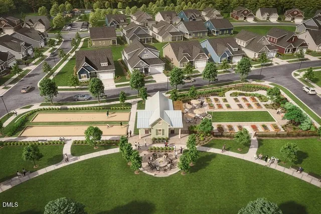 a view of swimming pool with a garden and plants