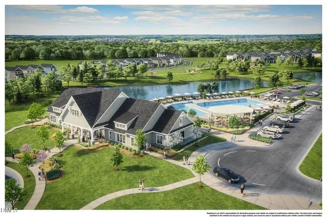 an aerial view of a house with yard swimming pool and outdoor seating