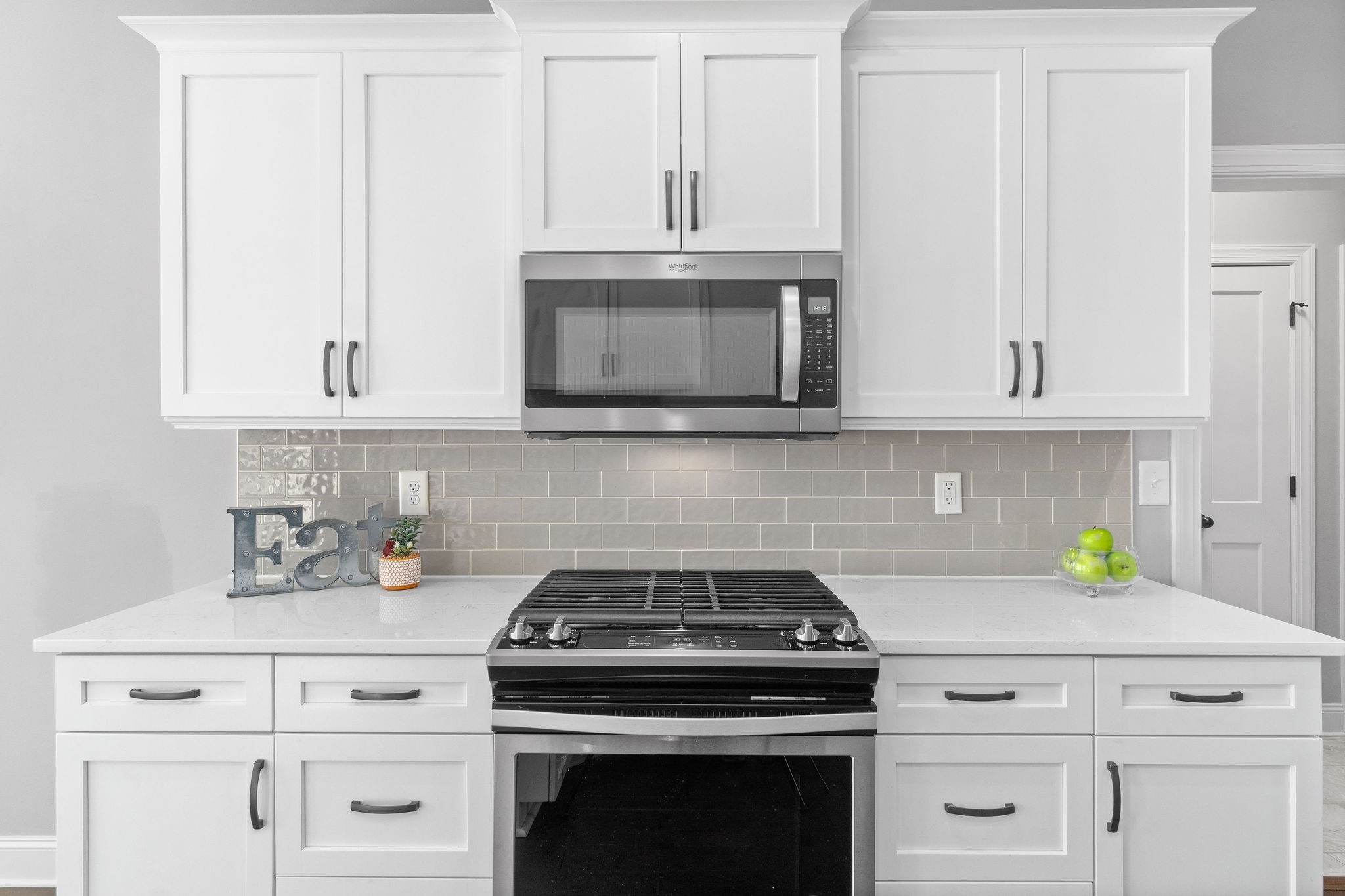 520 Larkspur Drive Clarksville, TN 37043 - Photo 14 of 34 a kitchen with granite countertop white cabinets and stainless steel appliances