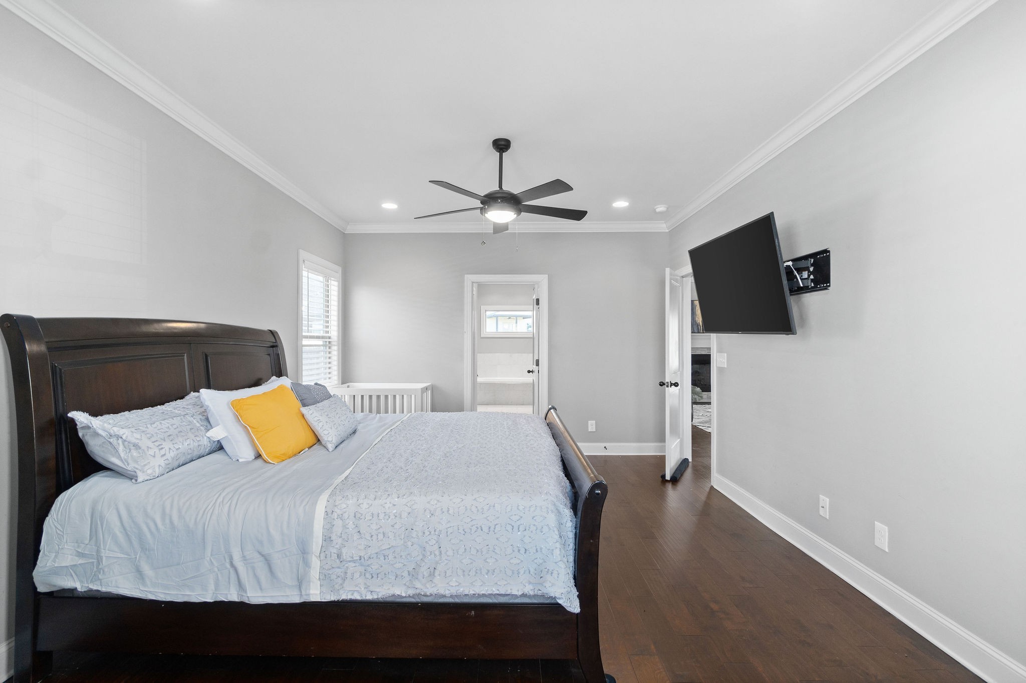 520 Larkspur Drive Clarksville, TN 37043 - Photo 18 of 34 a bedroom with a bed and a flat screen tv
