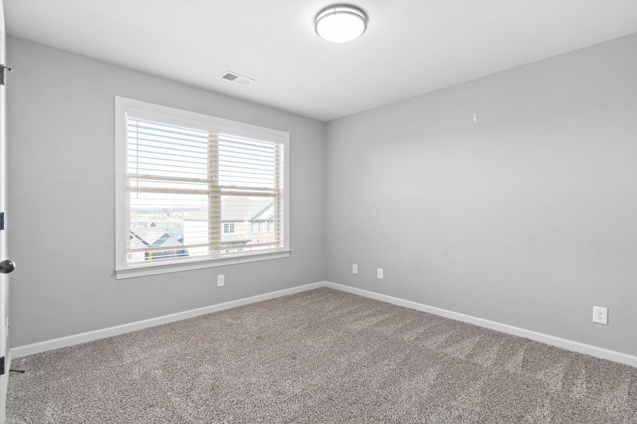 520 Larkspur Drive Clarksville, TN 37043 - Photo 24 of 34 an empty room with windows