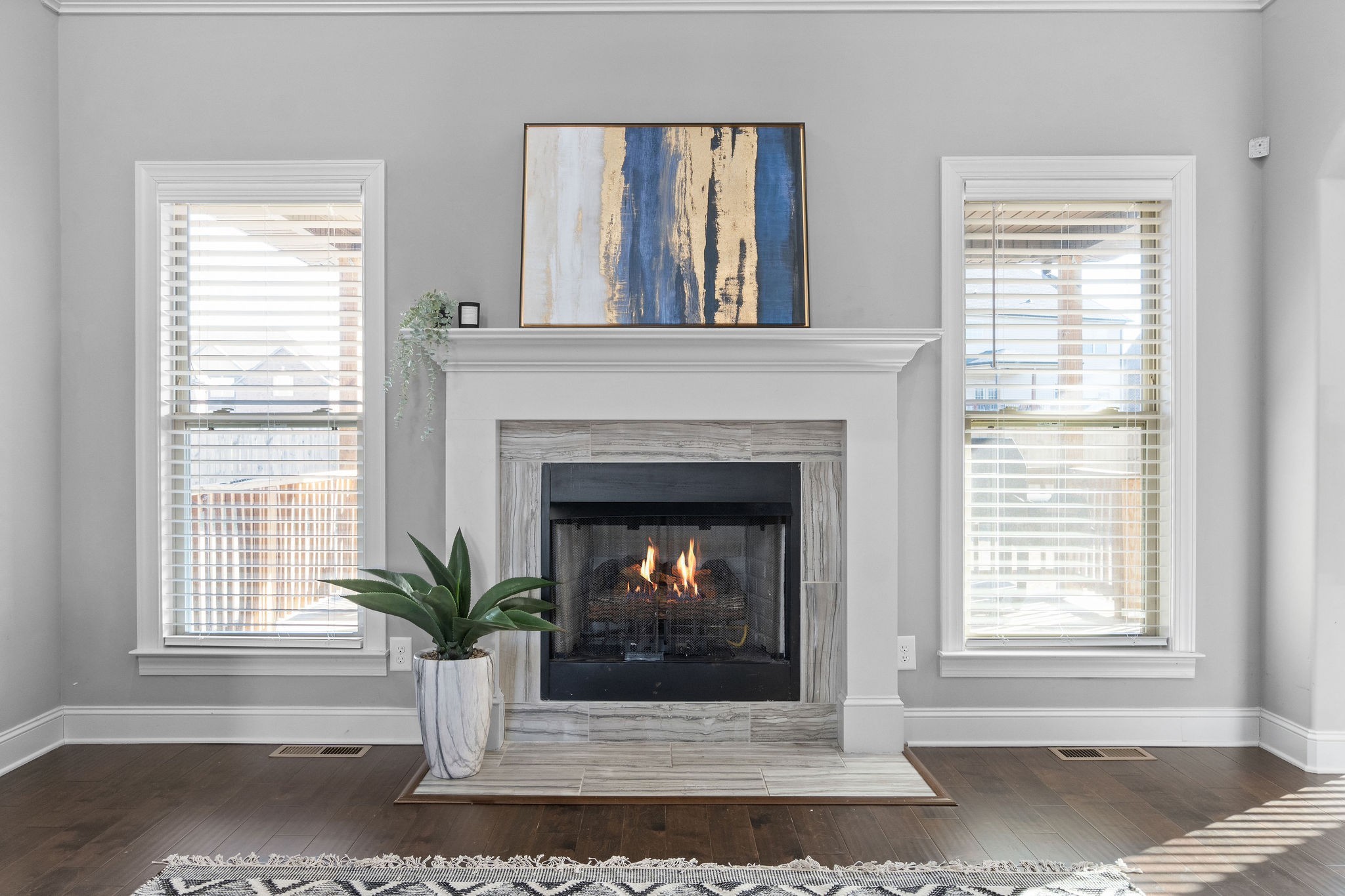 520 Larkspur Drive Clarksville, TN 37043 - Photo 7 of 34 a living room with a fireplace and windows