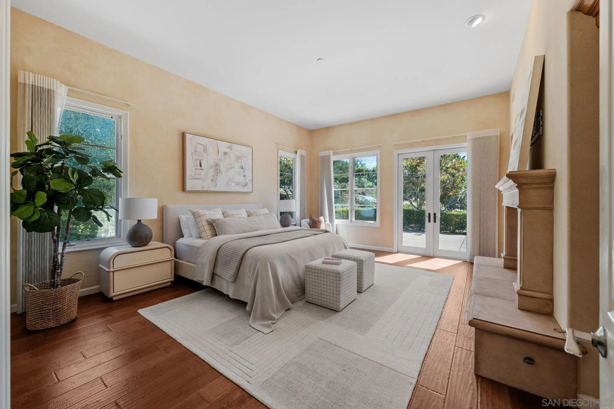 17813 La Amapola Rancho Santa Fe, CA 92067 - Photo 14 of 30 a spacious bedroom with a large bed and a couch