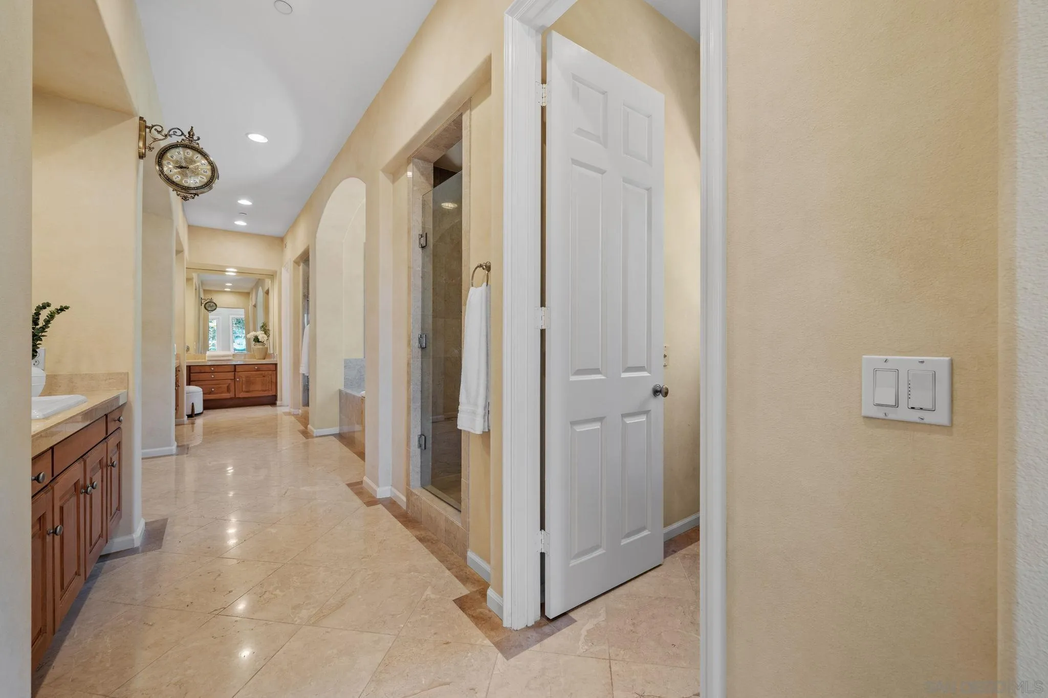 17813 La Amapola Rancho Santa Fe, CA 92067 - Photo 16 of 30 a view of a hallway with furniture and a bathroom