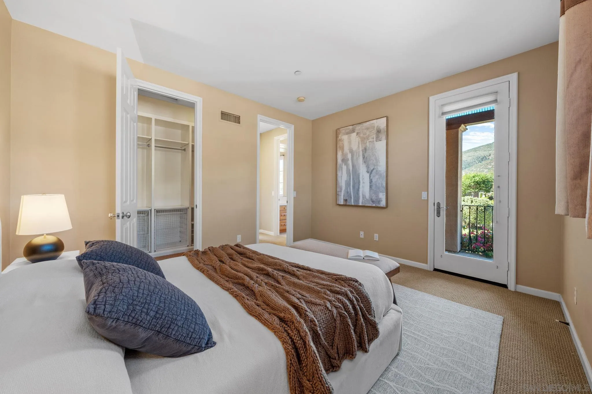 17813 La Amapola Rancho Santa Fe, CA 92067 - Photo 20 of 30 a bedroom with a large bed and a window