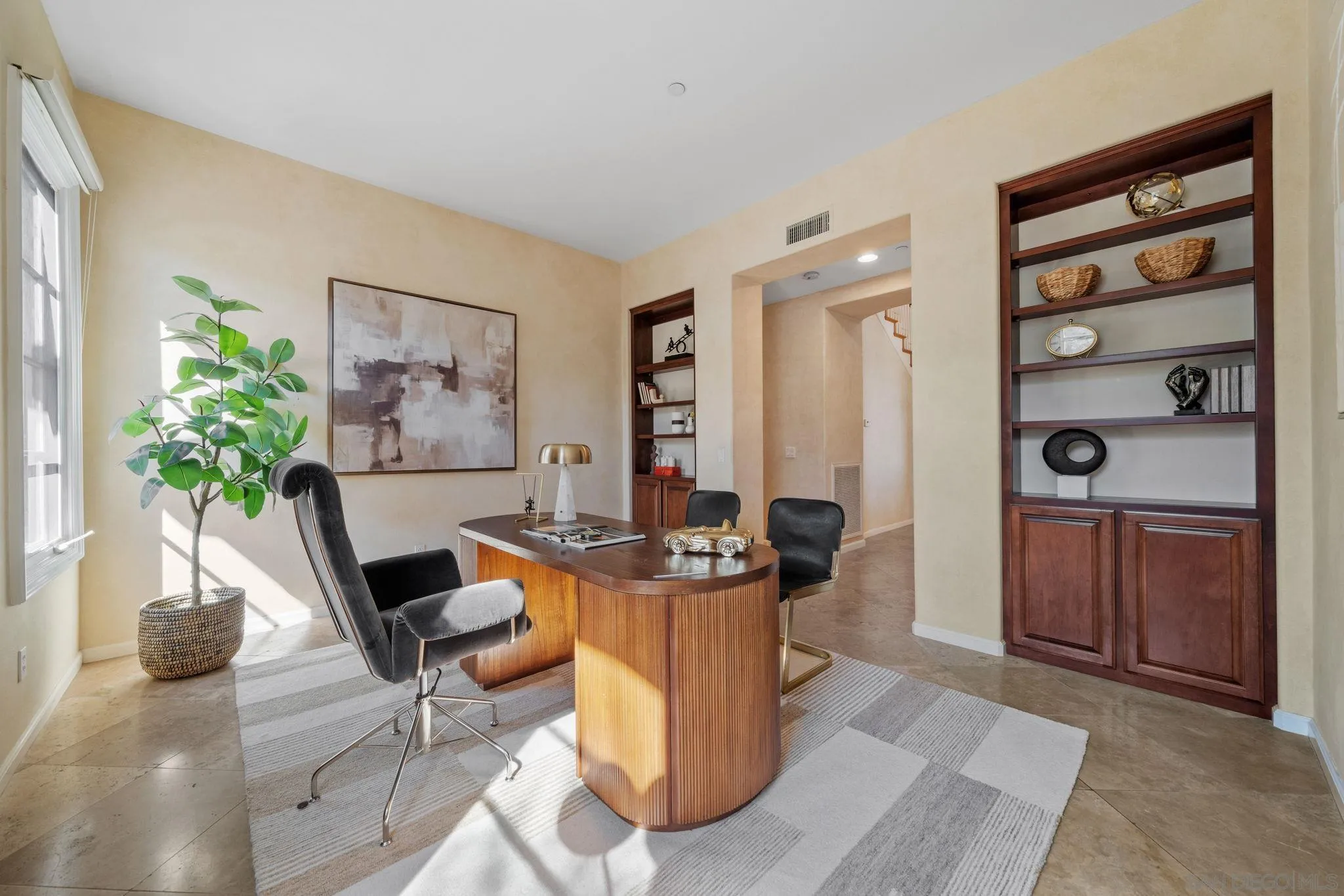 17813 La Amapola Rancho Santa Fe, CA 92067 - Photo 22 of 30 a living room with furniture a dining table and chairs with wooden floor