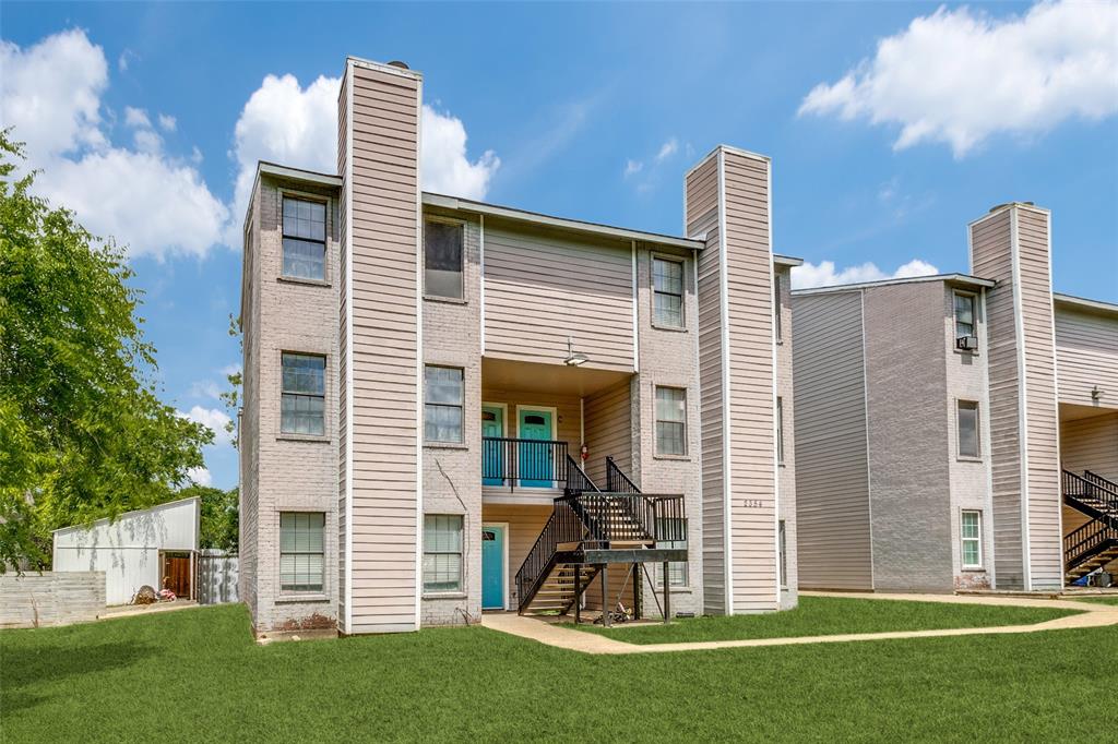 2354 Little Pocket Road, Unit B Dallas, TX 75228 - Photo 1 of 12 Rear view of house with a yard, a chimney, and a balcony