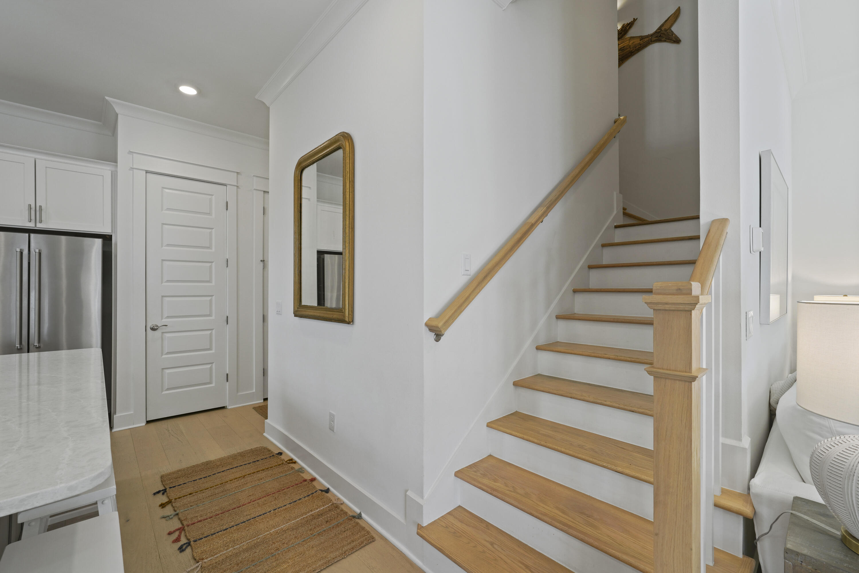 96 Wharf Ln Inlet Beach, Unit B Inlet Beach, FL 32461 - Photo 16 of 44 a view of entryway with wooden floor and stairs