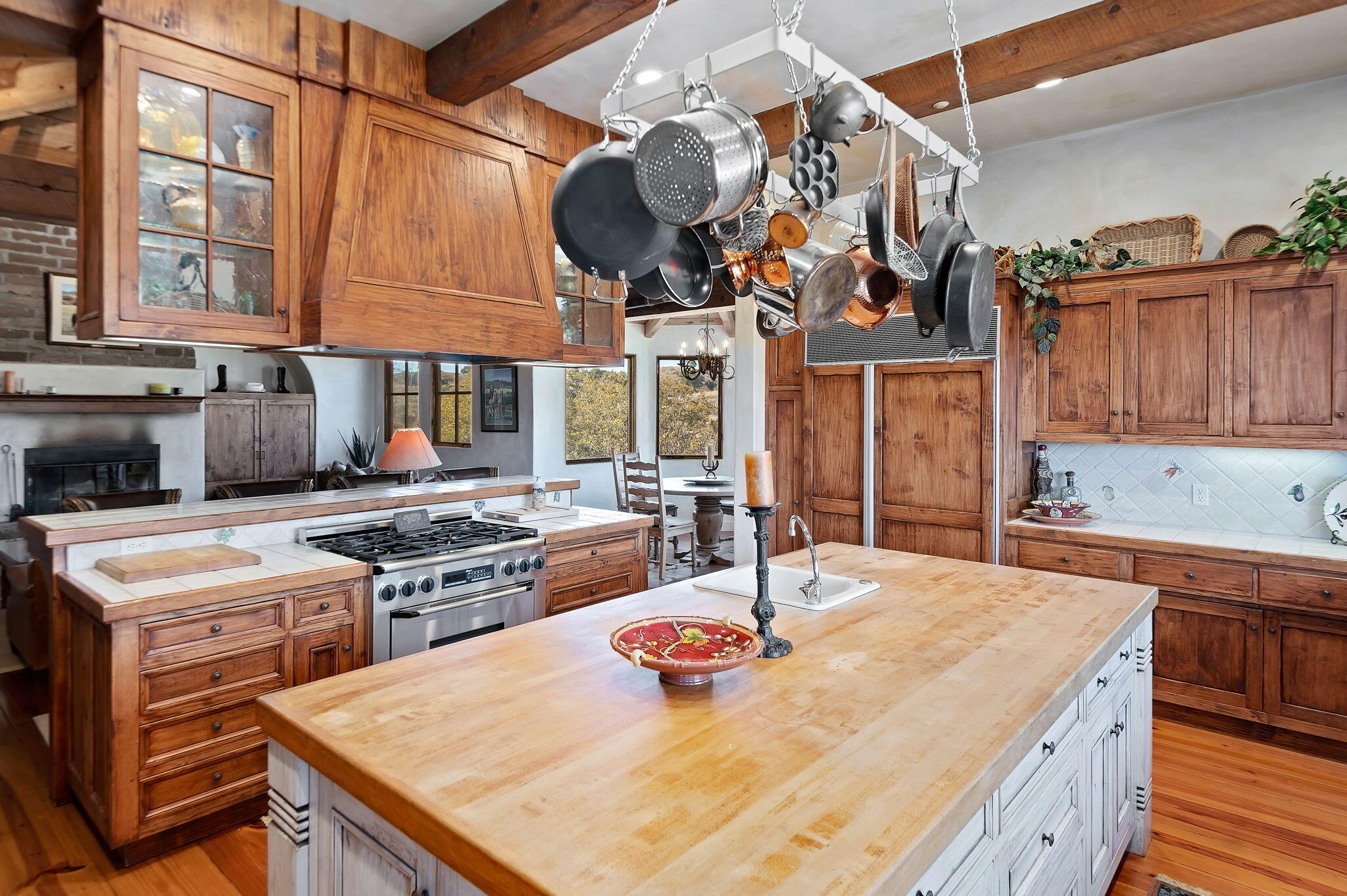 4600 Tim's Road Santa Ynez, CA 93460 - Photo 14 of 47 a kitchen with a stove a sink and a refrigerator