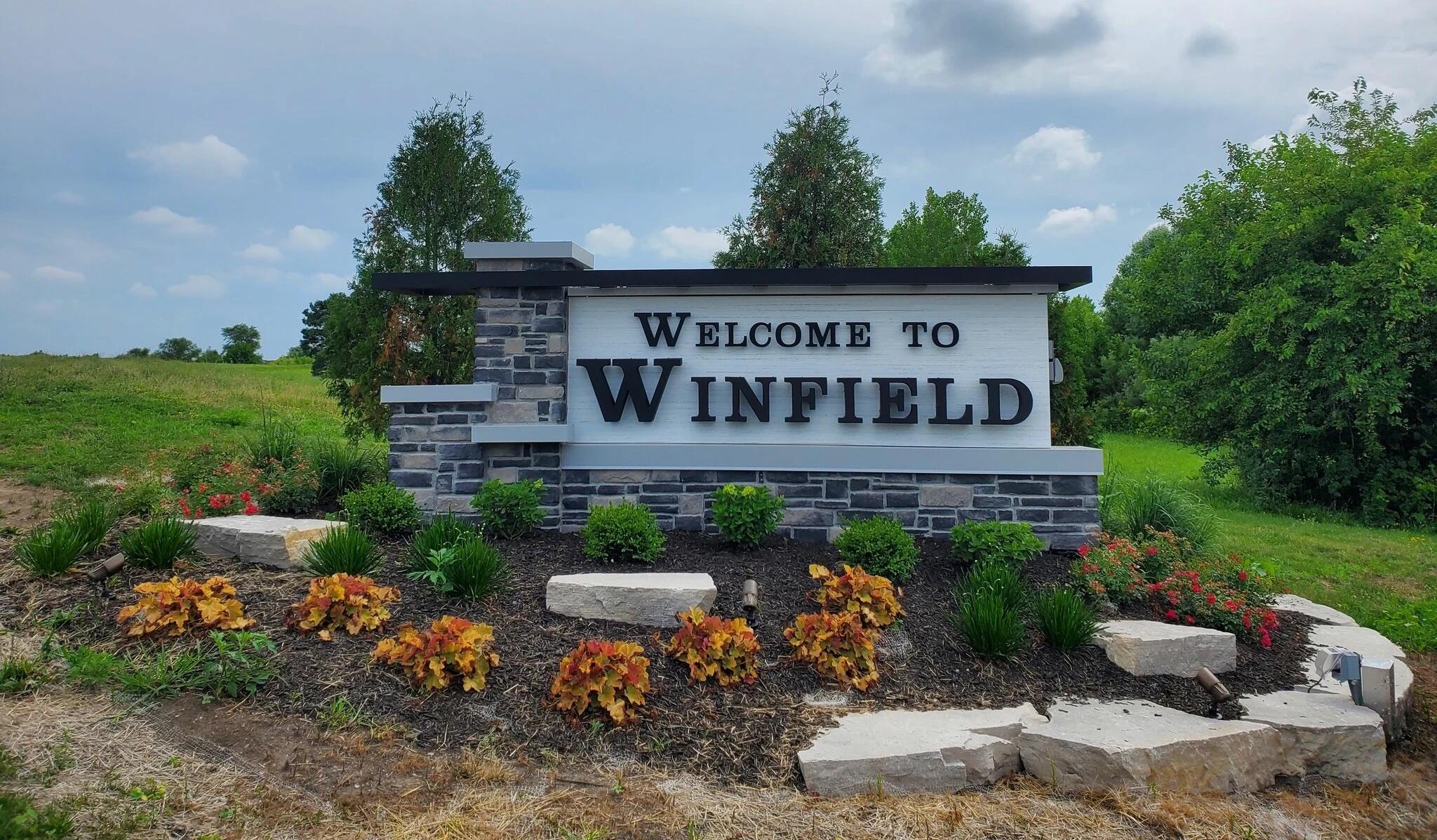 8310 Doubletree Court Crown Point, IN 46307 - Photo 5 of 5 a view of a house with garden and plants