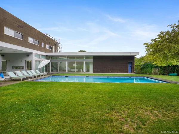 a front view of house with yard and seating area