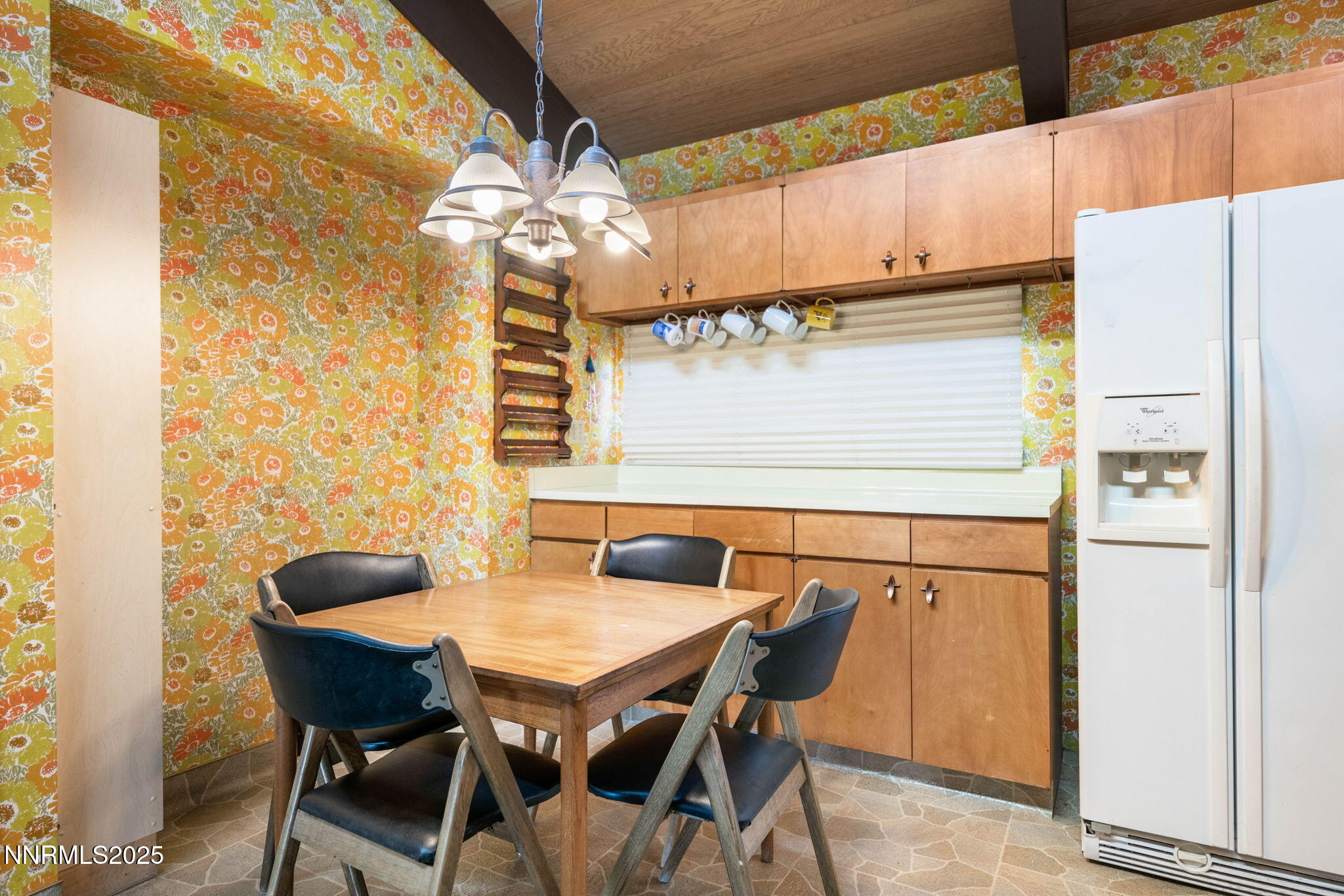 77 Ophir Mill Road Dayton, NV 89403 - Photo 12 of 44 a view of a dining table and chairs