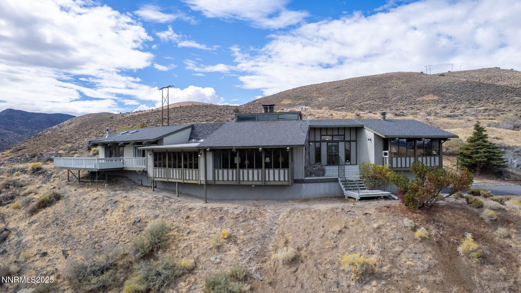 77 Ophir Mill Road Dayton, NV 89403 - Photo 2 of 44 a view of a house with a yard