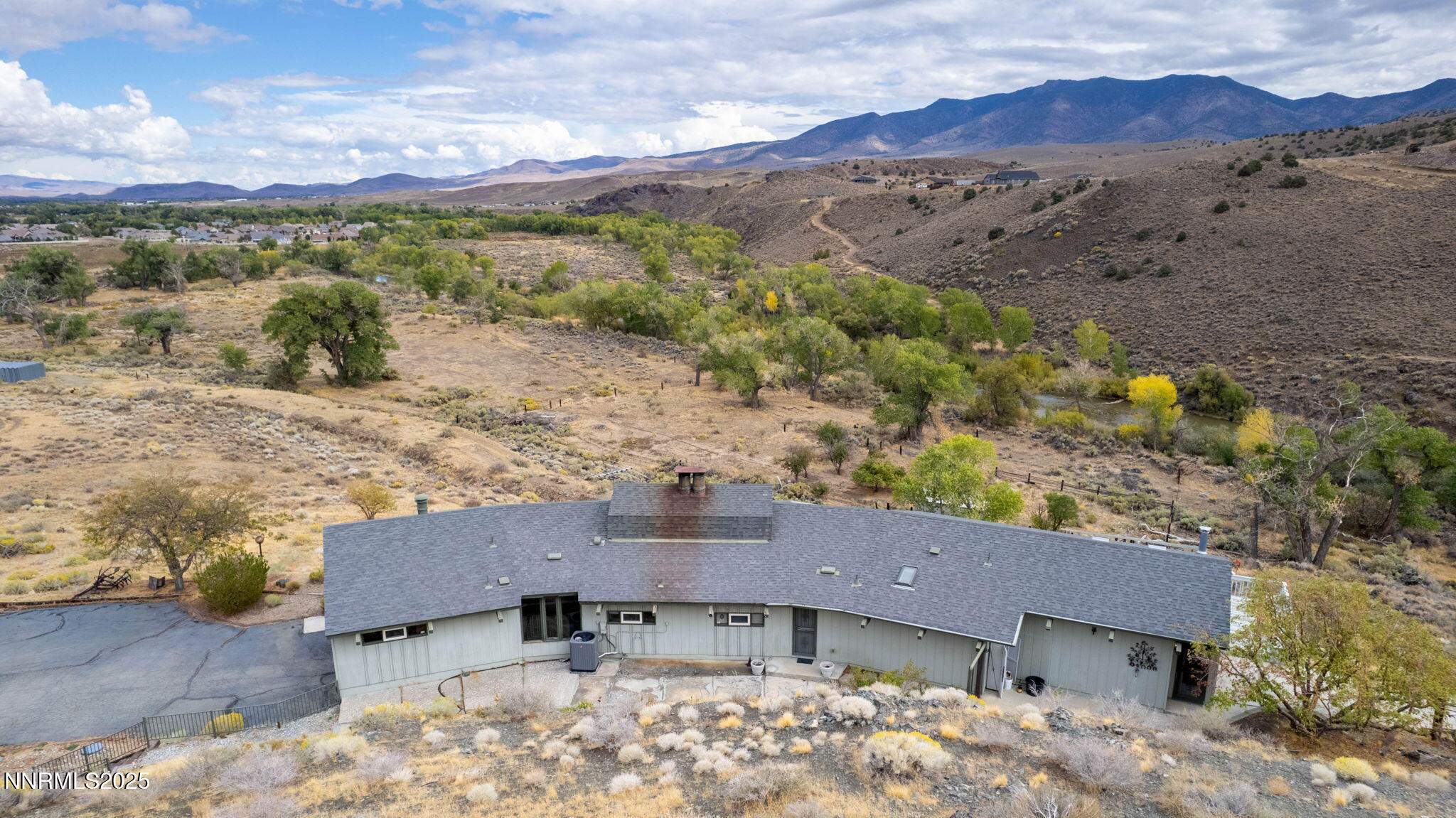 77 Ophir Mill Road Dayton, NV 89403 - Photo 23 of 44 a view of a house with a yard
