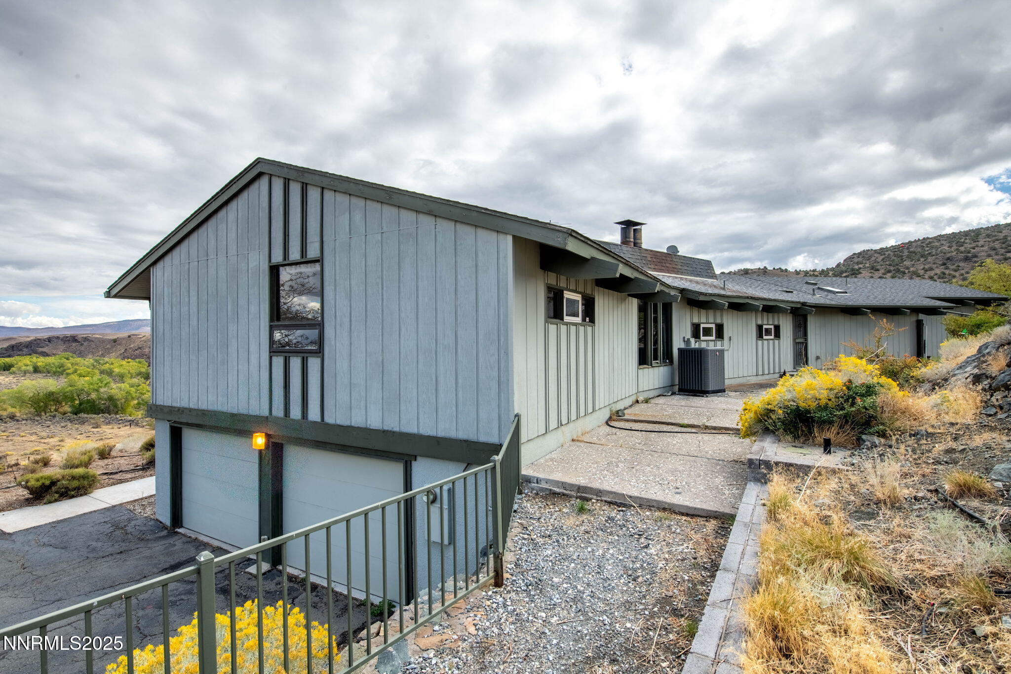 77 Ophir Mill Road Dayton, NV 89403 - Photo 26 of 44 a front view of house along with street