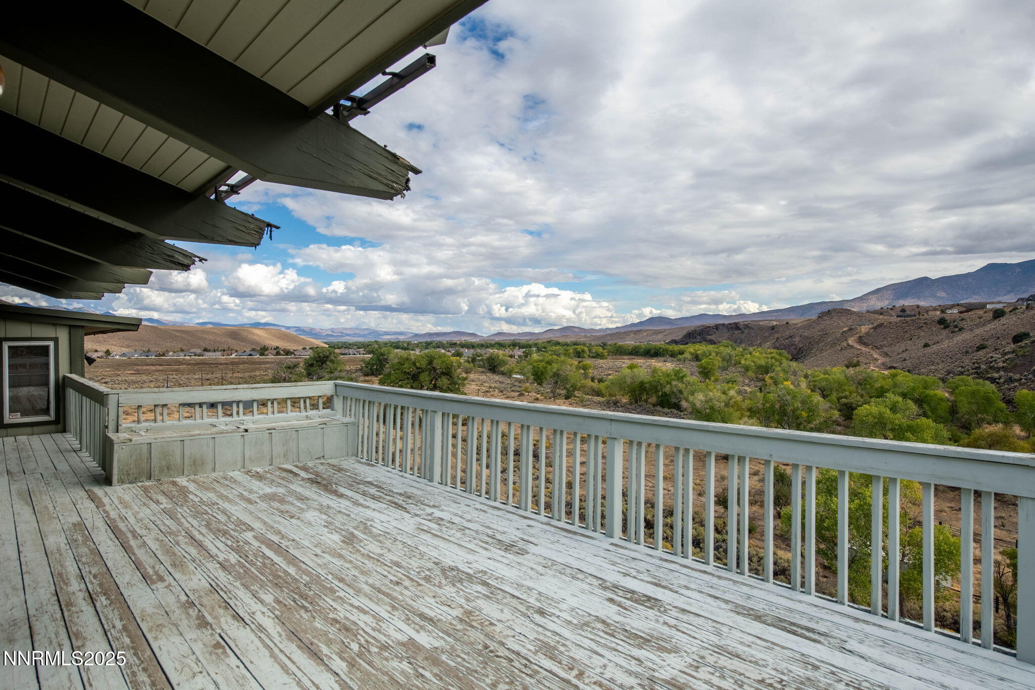 77 Ophir Mill Road Dayton, NV 89403 - Photo 28 of 44 a view of balcony with wooden floor