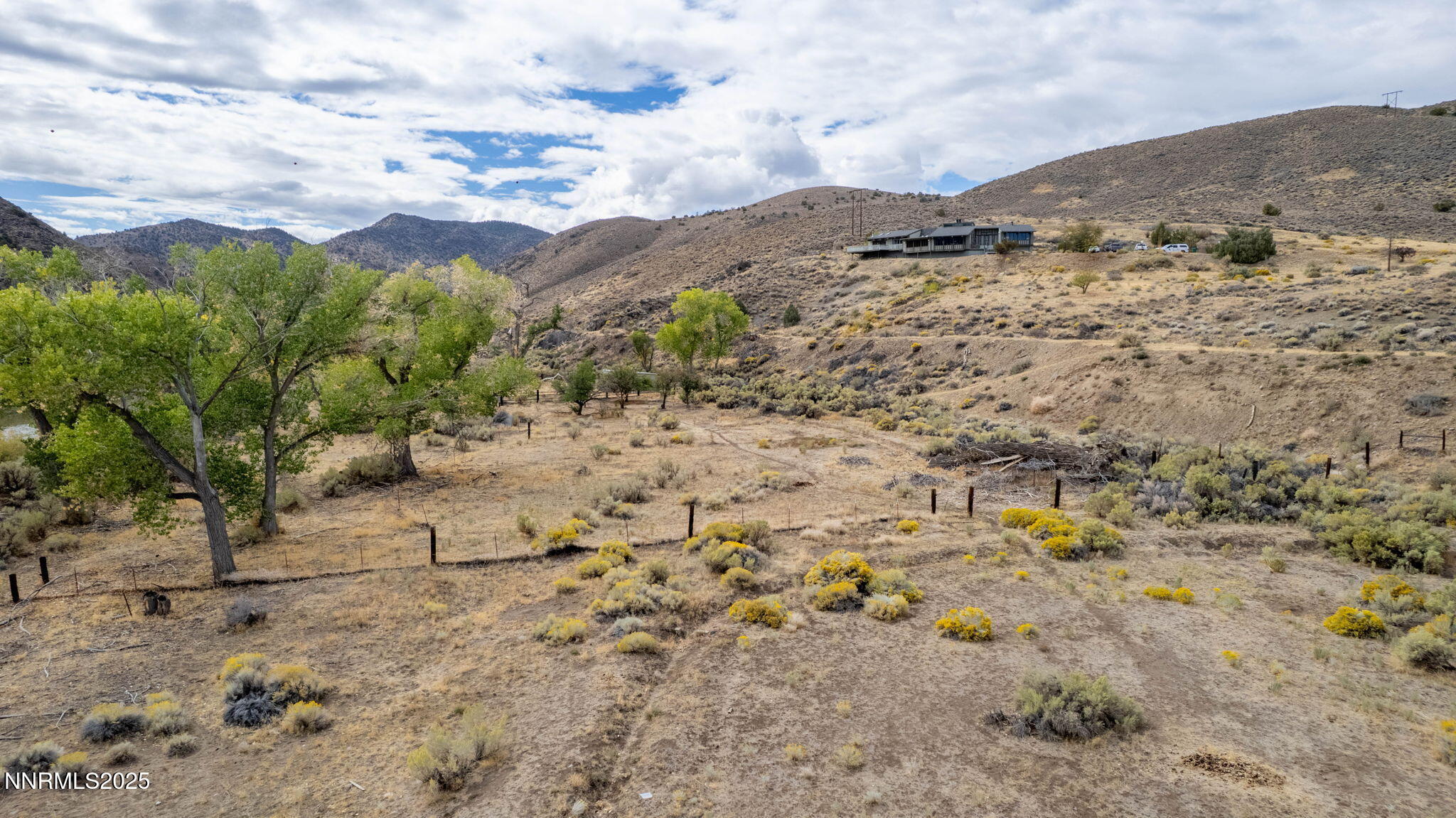 77 Ophir Mill Road Dayton, NV 89403 - Photo 32 of 44 a view of a road with a building in the background