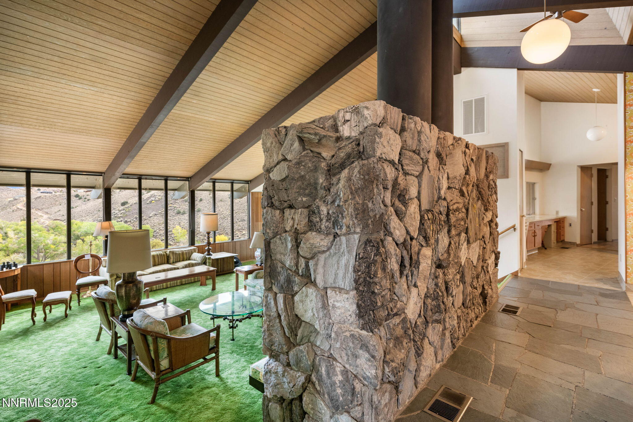 77 Ophir Mill Road Dayton, NV 89403 - Photo 35 of 44 a living room with furniture and a rug