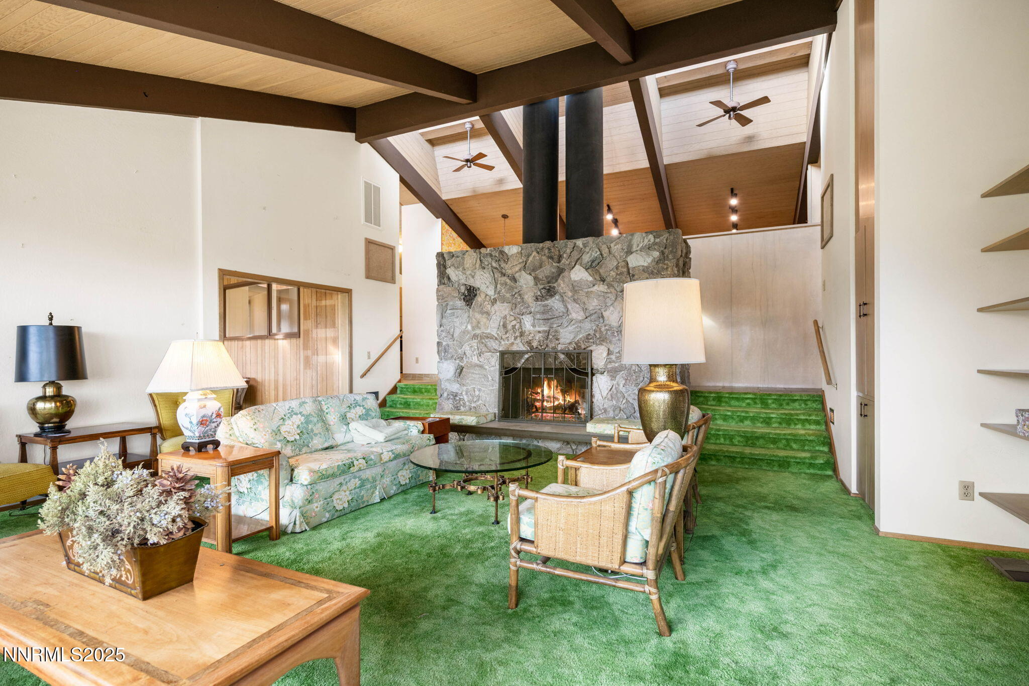 77 Ophir Mill Road Dayton, NV 89403 - Photo 37 of 44 a living room with furniture and a fireplace