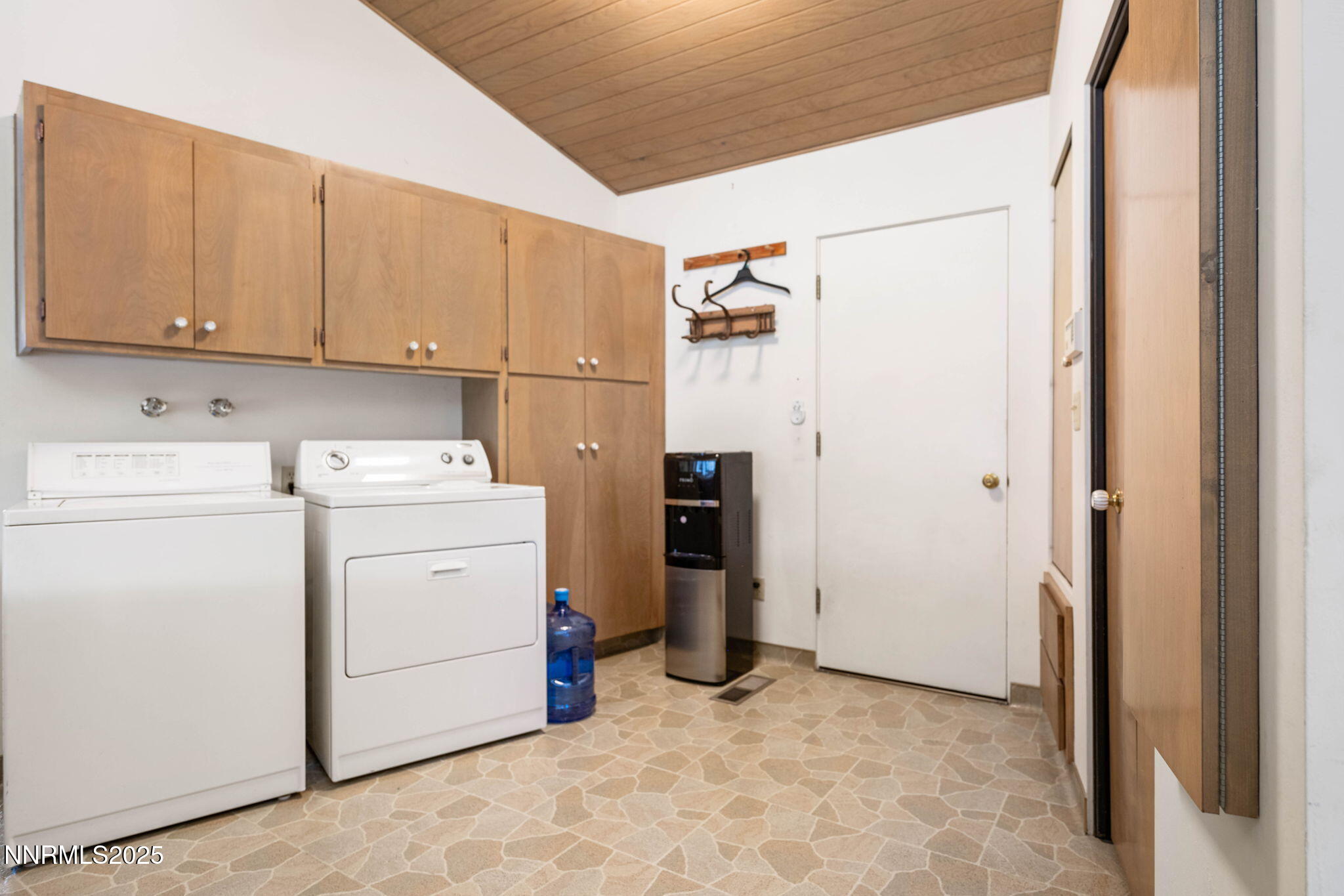 77 Ophir Mill Road Dayton, NV 89403 - Photo 41 of 44 a view of a storage & utility room with dryer and washer